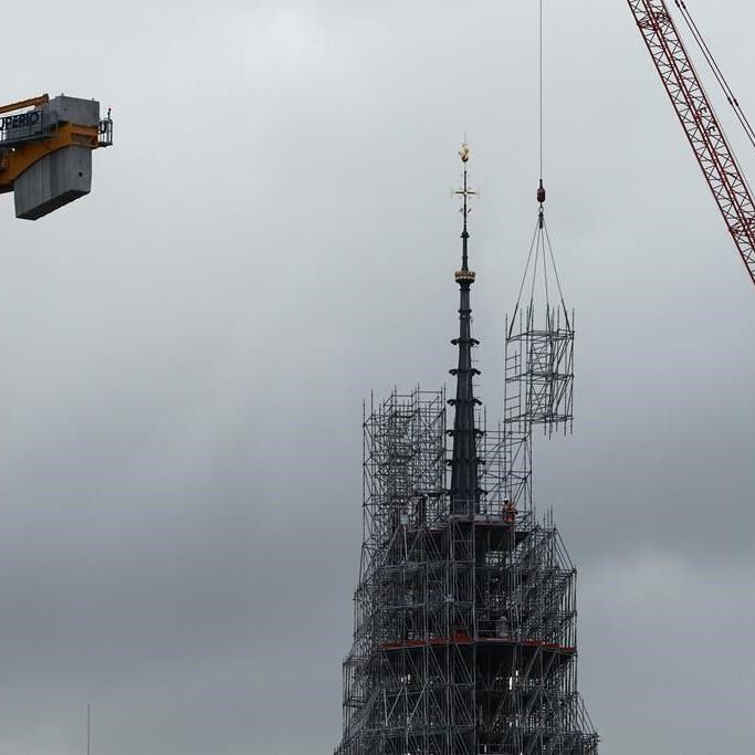 Notre Dame cathedral's spire revealed in Paris as reconstruction continues after fire